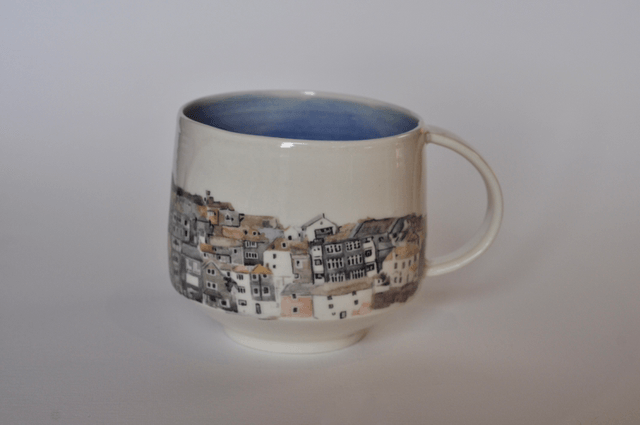 Porcelain cup with illustrated scene